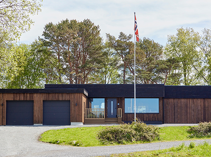 Forside av arkitekttegnet hus